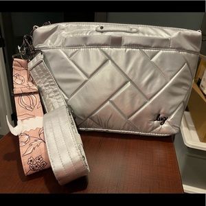 Nwt. Lug flare 2. Metallic silver. Beautiful bag just too big for me.